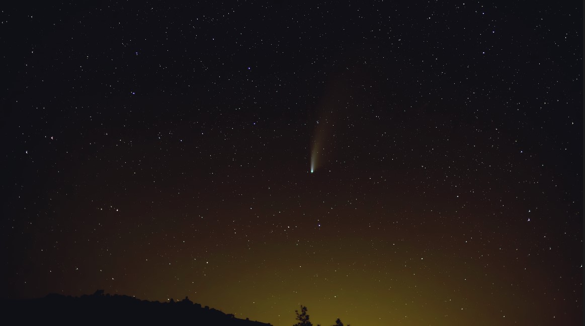 1 of 2 | Foothills under a night sky of clear stars