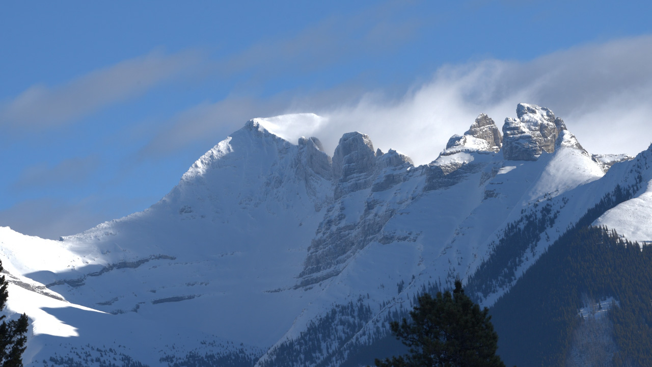 2 of 2 Banff National Park mountain peaks in cloud