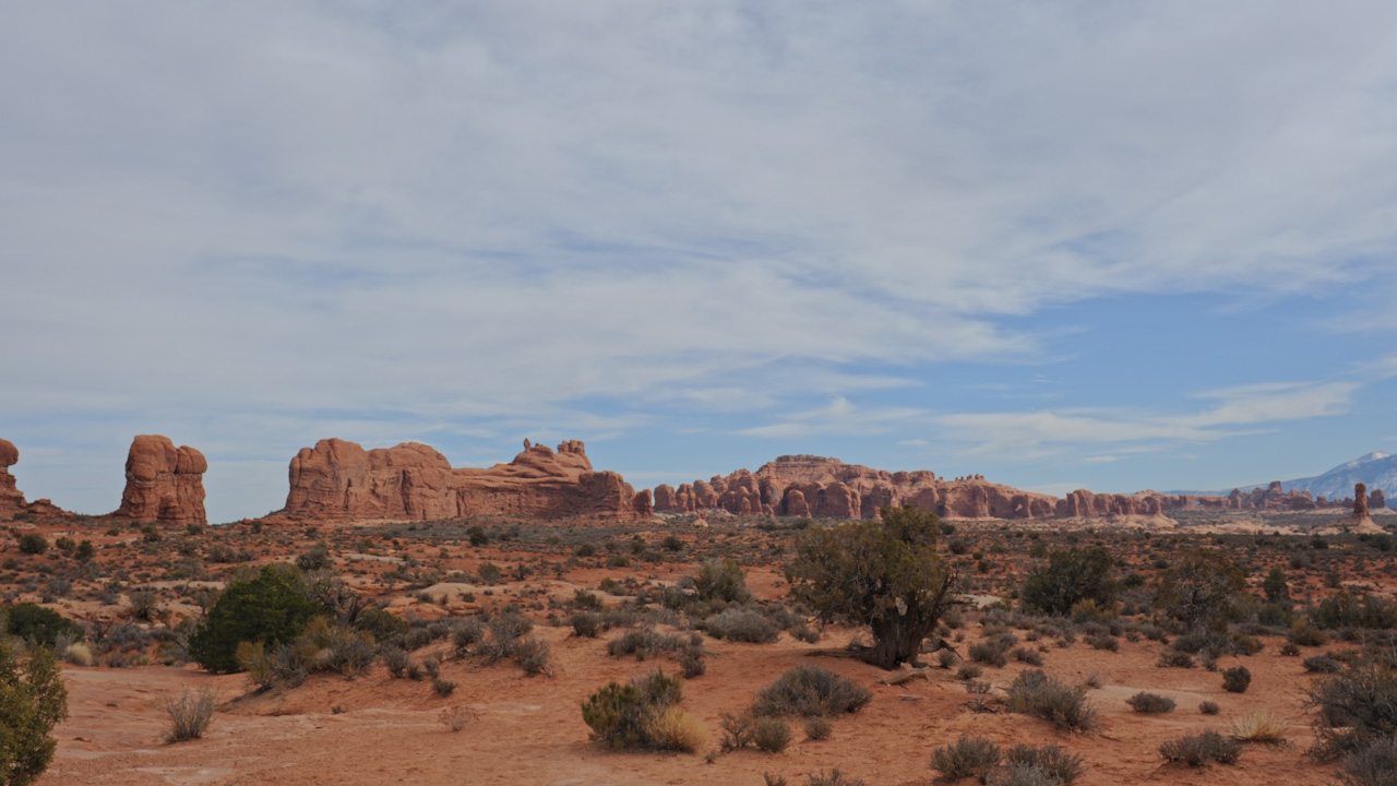 Arches National Park, a desert landscape under high clouds