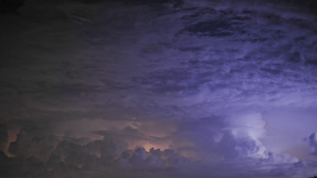 1 of 5 | Night lightning illuminates approaching…