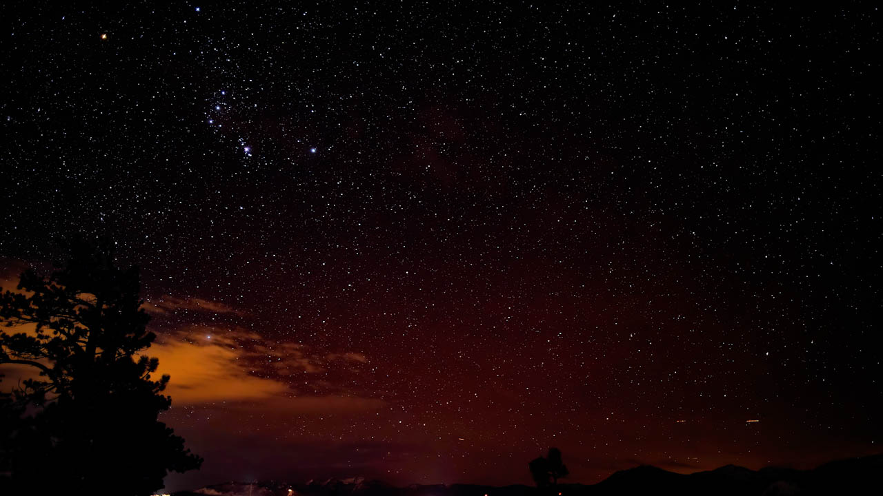 2 of 2 Clouds at night illuminated partly by city…