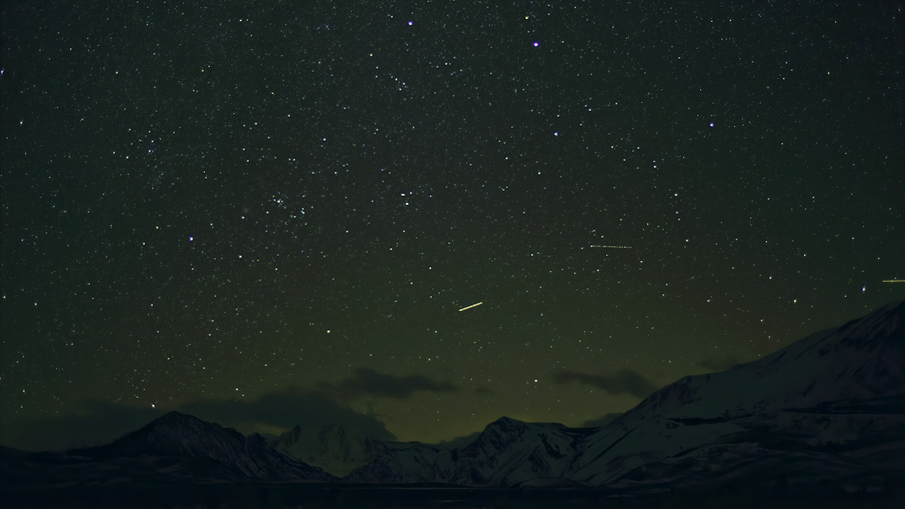 Night over mountains and clouds