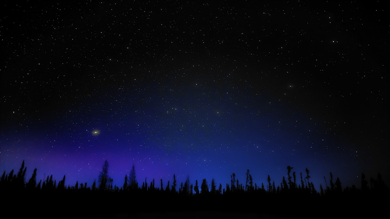 Early night above a boreal forest in Alberta, Canada