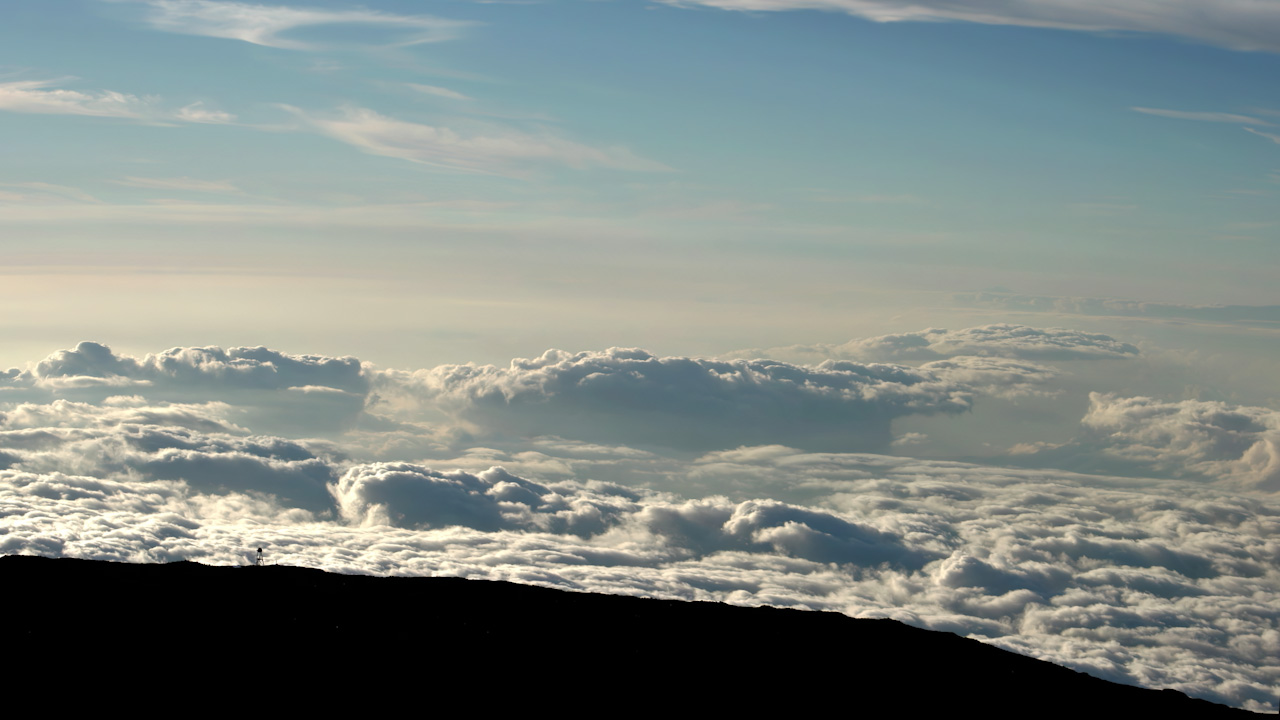 High above clouds and volcanic landscapes
