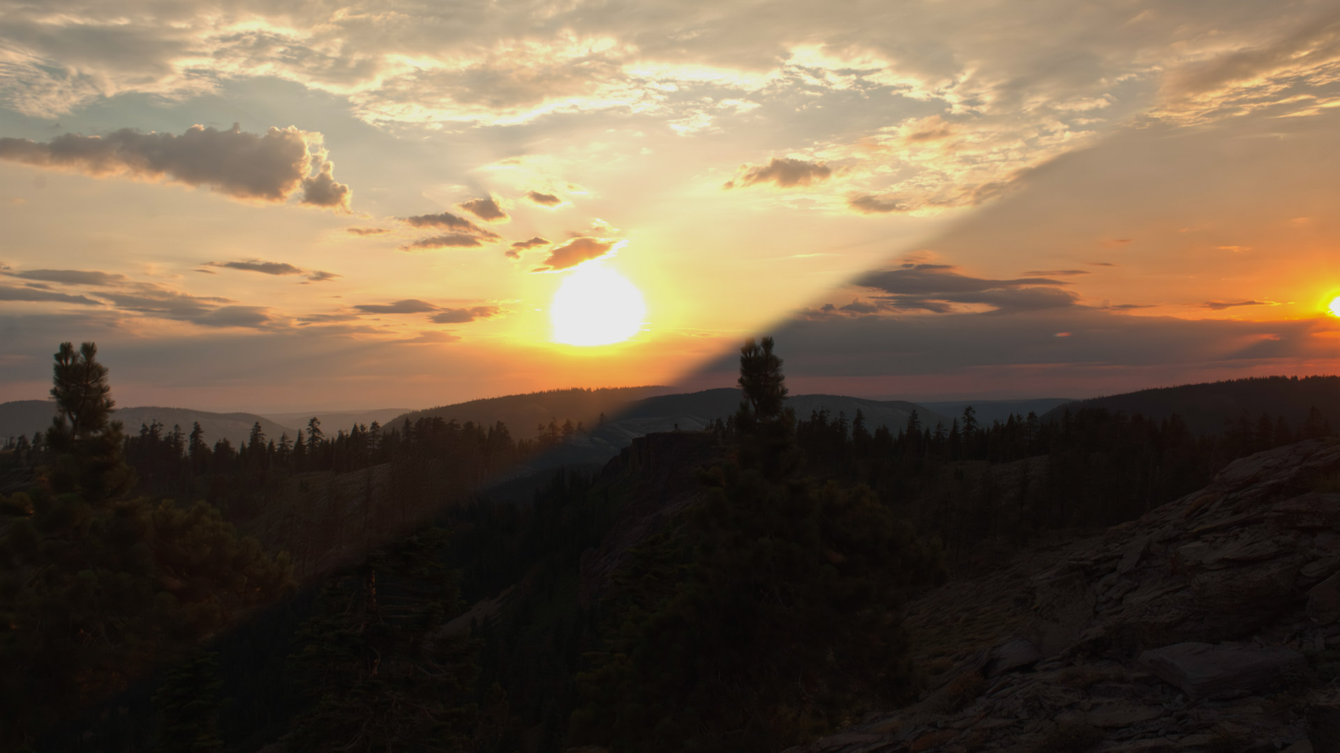 Panning to the left at sunset on rocky mountainous land