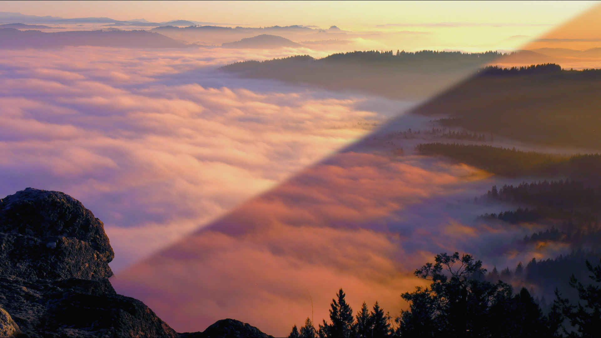 1 of 2 | Behind stones in the valley, bright fog flows below on the dark woods