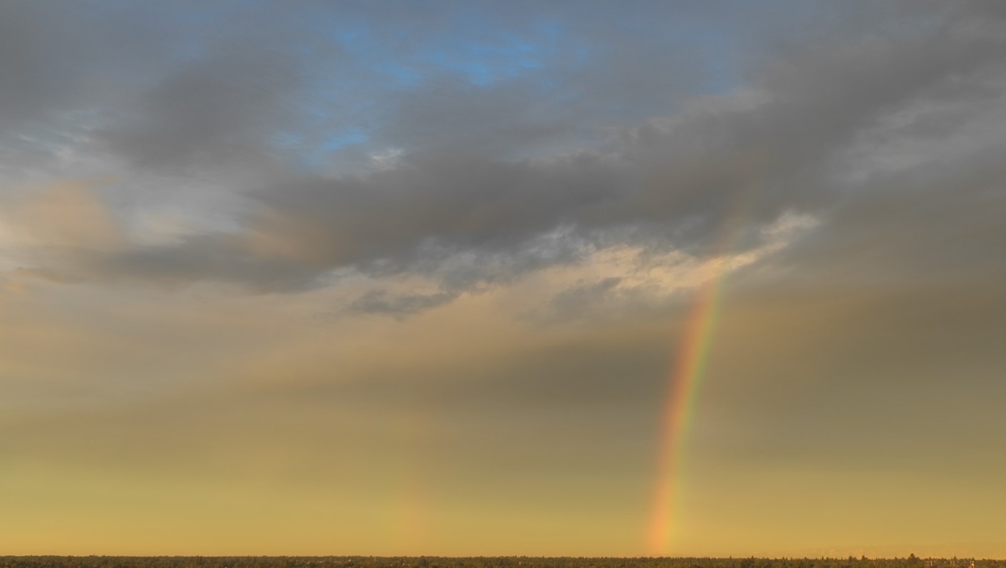 Early day rainbow fades